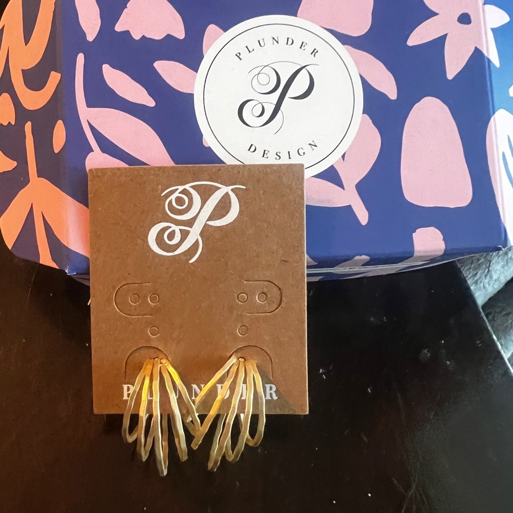 Gold Plunder Half Hoop Earrings.